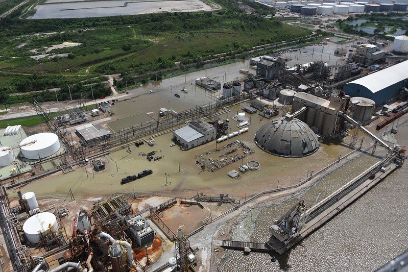 A flooded industrial plant in a Texas port. US Coast Guard flyover image. Courtesy of Creative Commons.